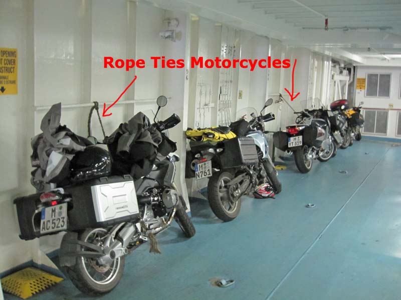 p330s_2010_09_24_motorcycles_tied_to_wall_inside_corsica_ferry.jpg
